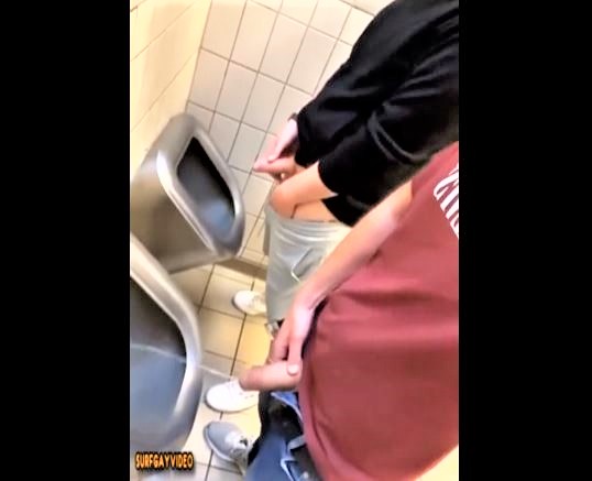 Boys piss school wc